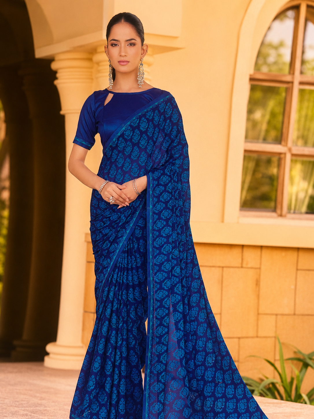 Semi crepe saree with stone work