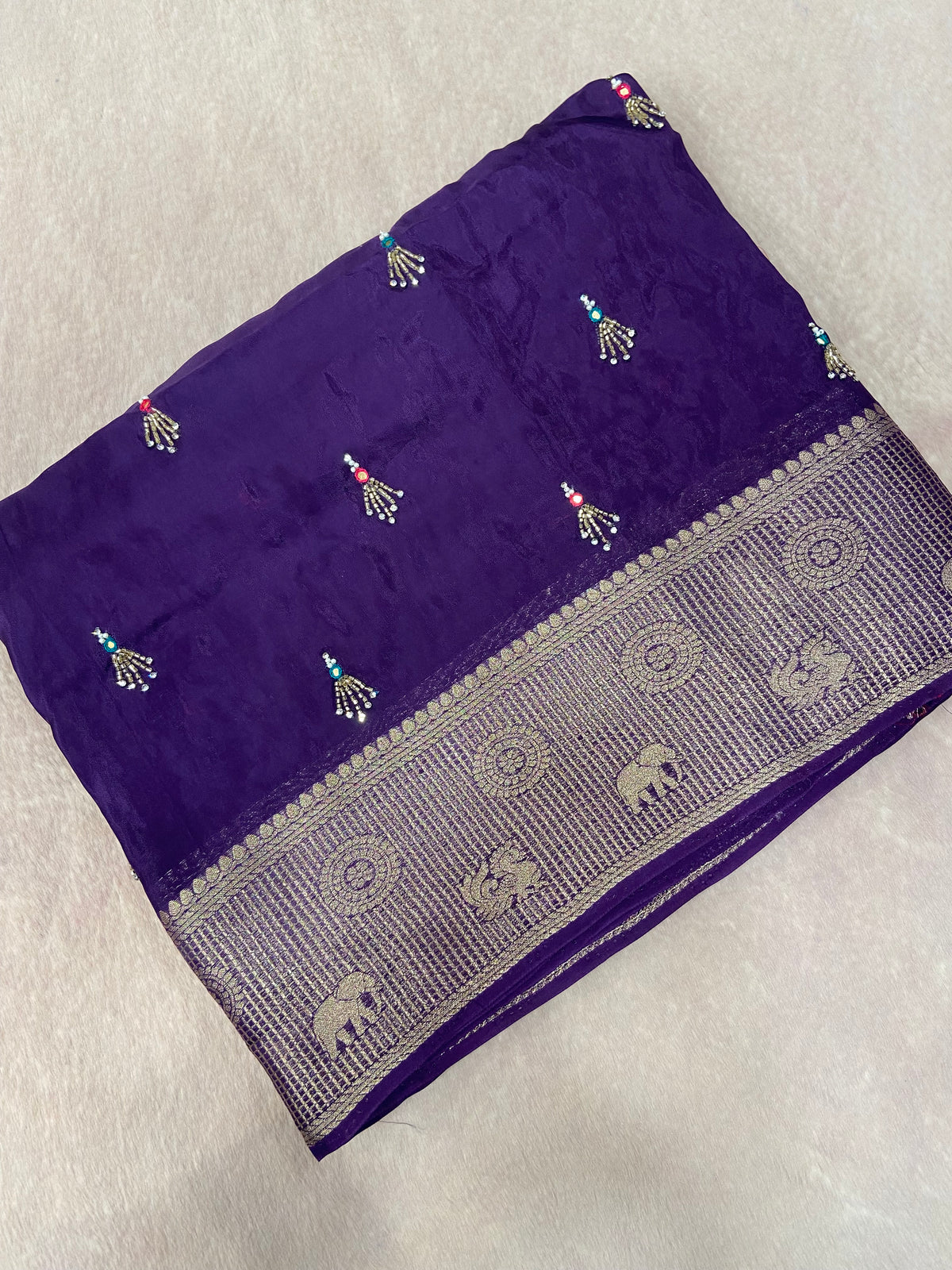 Pure crepe chinnon saree with cutdana work
