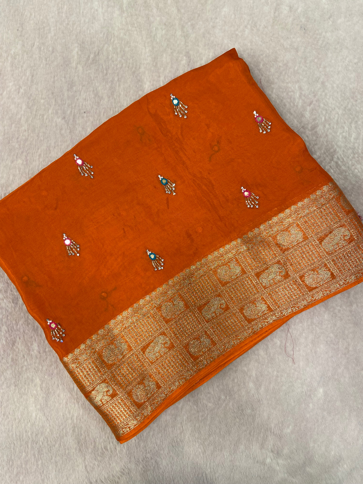 Pure crepe chinnon saree with cutdana work