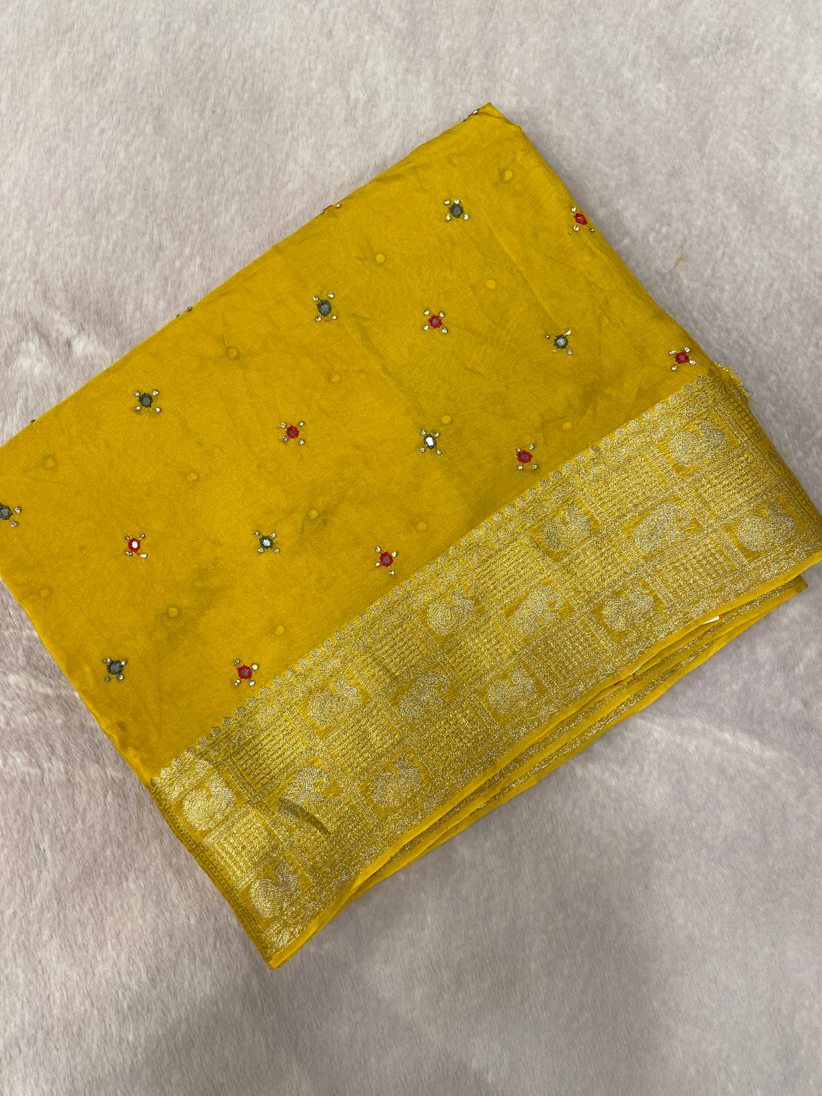 Pure crepe chinnon saree with cutdana work
